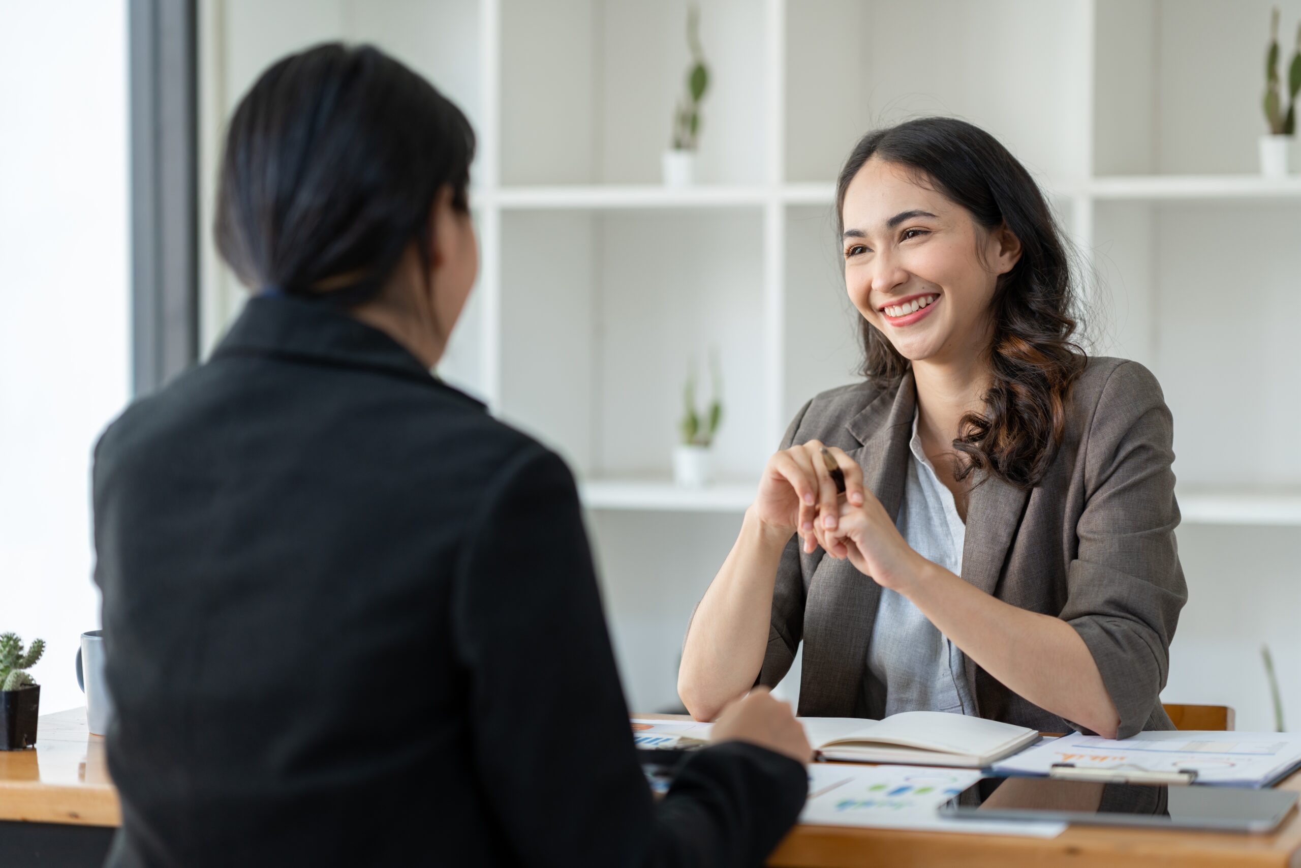 woman standing out on first marketing job
